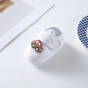 White baby soft sole shoe with gold stars and small car ornament for infants 0-1 year