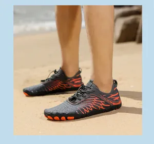 Detail of breathable non-slip water shoes on sand for beach and swimming activities
