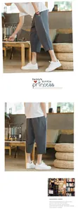 Close-up of men's linen harem pants in grey casual style for summer fashion