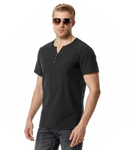 Detail of men's black linen cotton Henley t-shirt featuring three wooden buttons