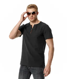 Caucasian male model wearing a black linen short sleeve Henley shirt with V-neck