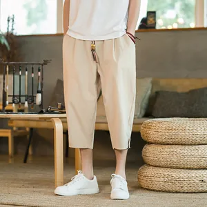 Casual men's summer linen cropped harem pants with tassel drawstring in traditional style