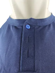Close-up detail of navy blue Henley collar with blue button on a men's athletic vest