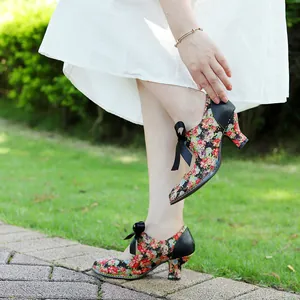Close-up detail of vintage American pastoral floral high heels with elegant bow ribbon