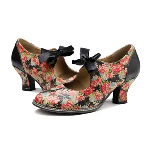 Vintage floral Mary Jane heels with bow detail and block heel for stylish women.