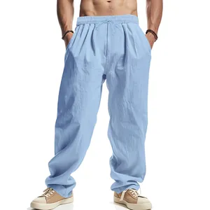 Casual light blue men's loose linen trousers featuring a drawstring elastic waist detail