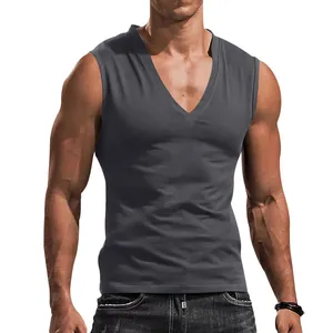 Close-up of a muscular man wearing a slim-fit dark grey V-neck sleeveless T-shirt
