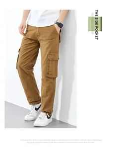 Detailed side view of brown loose straight cargo pants with functional pockets