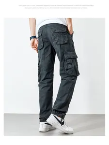 Detailed back view of men's dark grey loose-fitting cargo pants with large utility pockets.