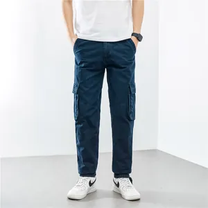 Men's loose straight-leg cargo pants with large side pockets in navy blue, outdoor casual style