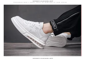 Detailed side view of trendy white men's sneakers with visible heel air cushion unit
