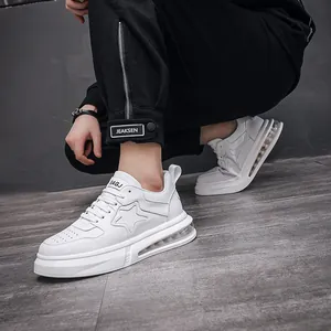 White men's air cushion sneakers with star pattern, stylish casual urban streetwear.