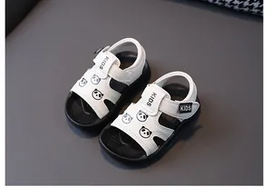 Detail view of white toddler sandals with panda print and non-slip black soft sole