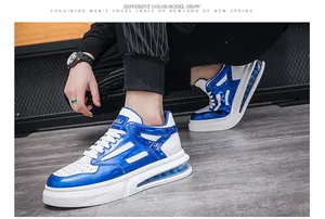 Side view macro of blue and white men's fashion sneakers with air cushion and glossy finish