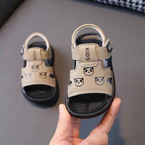 Close-up of khaki toddler sandals with cartoon panda design and non-slip sole