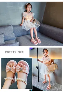 Detailansicht rosa Kinder Prinzessin Sandalen mit Schleife und Perlen