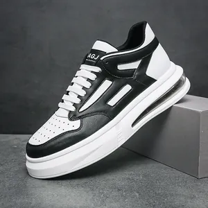 Stylish men's black and white sports sneakers featuring comfortable air cushion sole design
