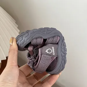 Detail showing the flexibility of purple soft-sole children's sport sandals