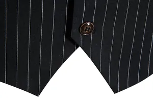 Close-up detail of a vintage black pinstripe vest for men showing fabric texture and button.