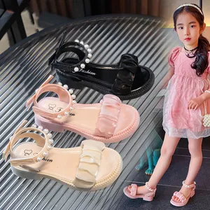 Sandales d'été pour filles avec bride élégante en perles et semelle souple à volants
