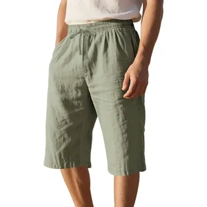 Detail of men's linen casual shorts featuring drawstring waist and textured fabric.
