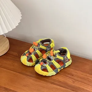 Detailed macro shot of kids' breathable sports sandals in vibrant yellow and grey colors