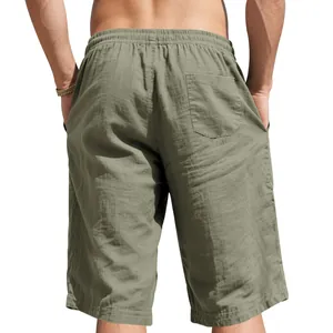 Back view detail of men's army green linen shorts showing elastic waist and pocket.