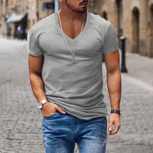 Close-up of a men's gray V-neck T-shirt showing the fit and fabric texture on a model