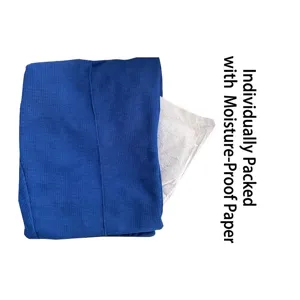 Detail view of blue waffle-knit fabric pants with moisture-proof paper packaging