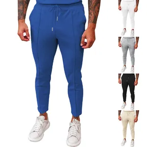 Collection of men's waffle knit casual trousers featuring drawstring elastic waistbands.