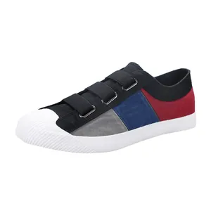 Casual multi-color canvas slip-on sneakers with triple velcro straps and ribbed toe cap
