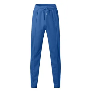 Detail view of blue men's waffle knit casual trousers with drawstring elastic waist band