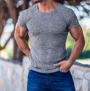 Close-up view of men's grey ribbed short sleeve athletic T-shirt for fitness and training