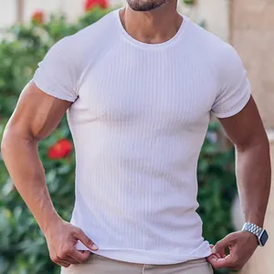 Close-up detail of the white ribbed fabric on a men's slim-fit fitness crew neck T-shirt.