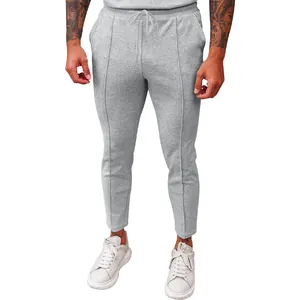 Men's grey waffle-textured casual trousers with drawstring elastic waist
