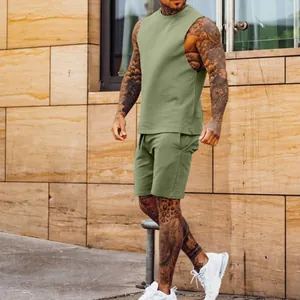 Side view detail of men's sleeveless olive green sports set with matching shorts