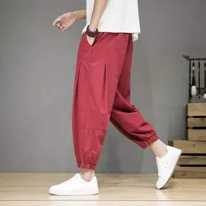 Men's loose cotton linen cropped lantern pants in red oriental casual style.