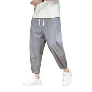 Men's loose cotton linen harem pants in light grey, summer casual style