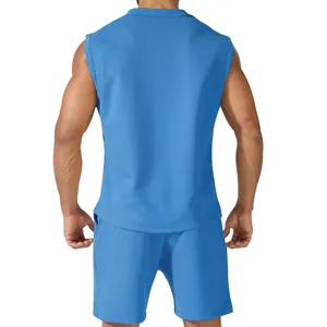 Rear view of a men's solid blue sleeveless sports tank top and shorts two-piece set
