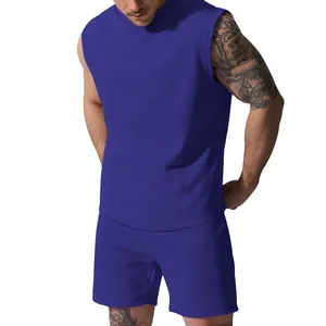 Close-up of men's blue sleeveless sports set showing athletic fit and fabric detail