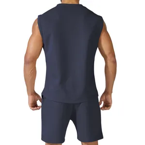 Back view of men's navy blue sleeveless athletic set featuring tank top and shorts