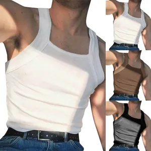 Macro view showing the ribbed texture and color variants of the slim fit tank top.