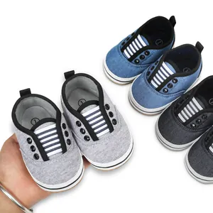Detail view of soft canvas baby walking shoes in multiple colors for infants