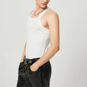 Detail shot of men's white tight sleeveless tank top showing fabric texture and fit