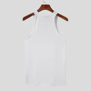 Back view of men's white ribbed tank top on a wooden hanger for a minimalist style