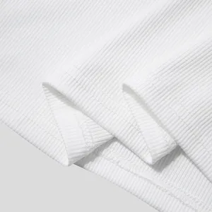Close-up of white ribbed fabric and stitching detail on men's slim fit tank top