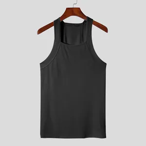Detailed view of a premium black ribbed cotton tank top for men with slim fit design