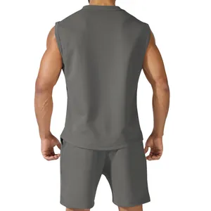 Back view detail of men's summer solid color sleeveless sports suit and shorts set in grey