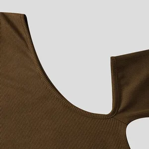 Detailed close-up showing the ribbed fabric texture and shoulder cut-out of this brown T-shirt