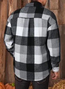 Back view of men's loose fit plaid flannel long sleeve shirt in black and grey